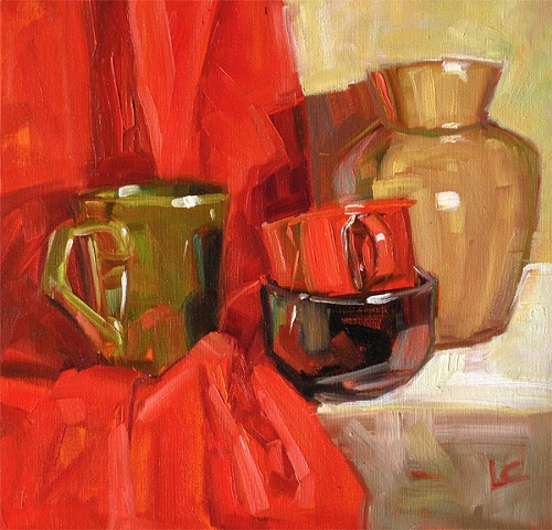 Still life with red cloth, green mug and black cup