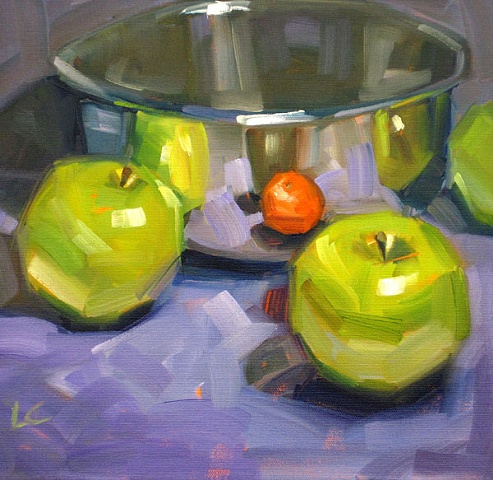 Still life with stainless bowl, green apples and mandarin orange