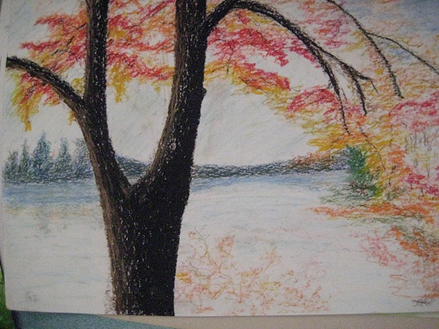 Tree by a lake in Fall