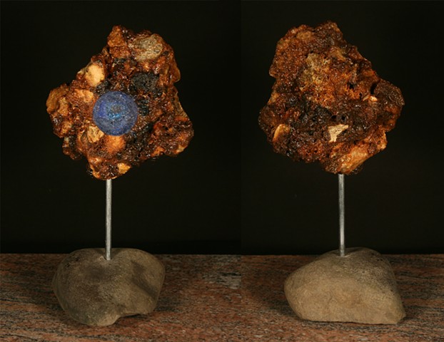 This mixed media sculpture of the “geode series” consists of a carved anthracite burnt culm mass, polyurethane, epoxy resin, mica powder and glass frit.