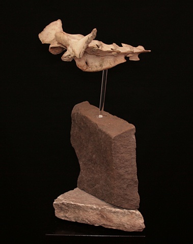 This is a modern contemporary mixed media sculpture of my interpretation of a wingsuit base jumper just “clearing the ridge” on his descent back to terra firma  by Denis A. Yanashot