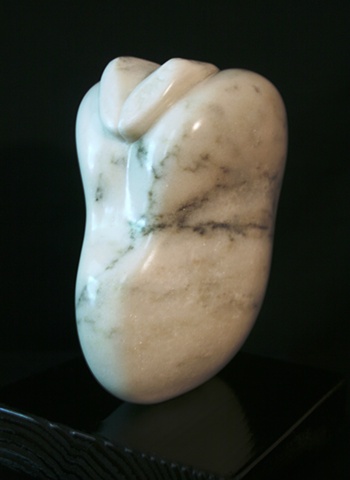This is a modern contemporary stone sculpture of a Fava Bean by Denis A. Yanashot