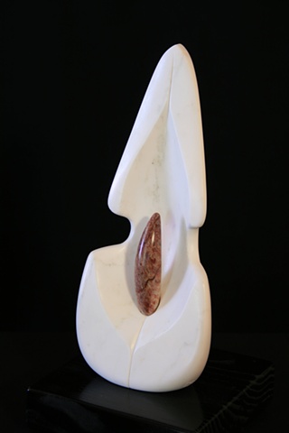 This is a modern contemporary stone sculpture of a flower bloom with pistil by Denis A. Yanashot