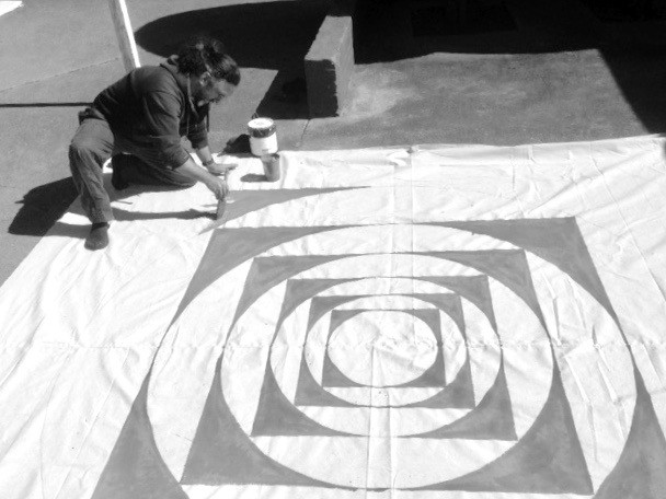 painting a mandala floor painting for Esalen workshop, 
