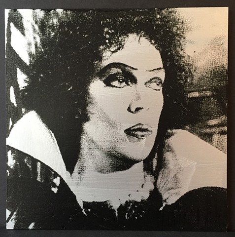 screenprinted image of tim curry's frank 'n' furter on silver-painted board. edition of 3.