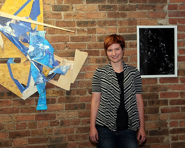 Artist Mara Baker (left multi media piece by Mara Baker, right archival pigment print by Robin Juan) 