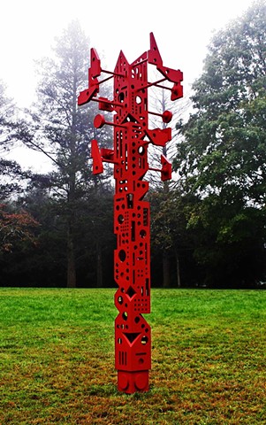 Signpost is totemic sculpture implying order and functionality while ultimately providing none. 
