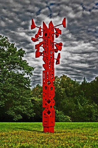 Signpost is totemic sculpture implying order and functionality while ultimately providing none. 