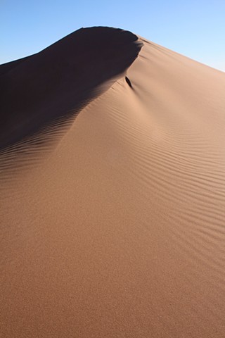 The Peak of a Dune in the Sahara Desert