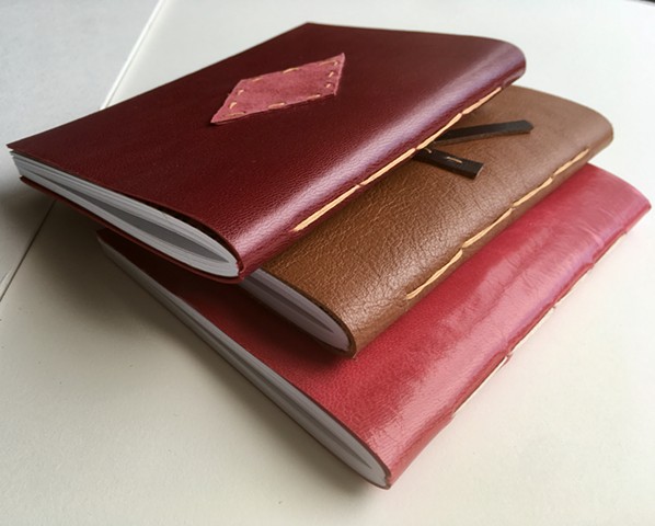 Leather pamphlet stitch notebooks 