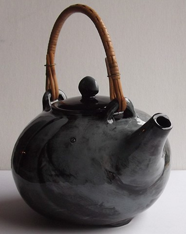 874. wicker handle teapot