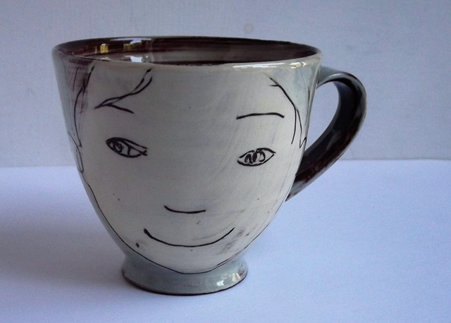 cup with faces