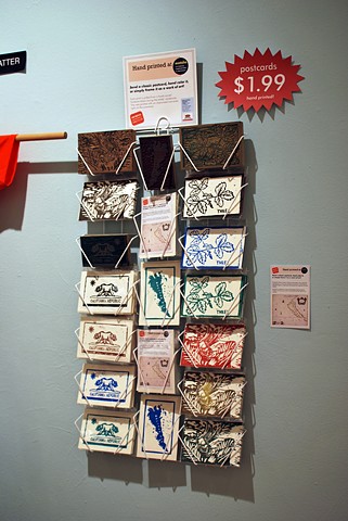 Hand-printed Postcard Display 
2012
Carved linoleum blocks, prints, and packaging