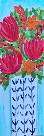 bright flowers in patterned vase by tracy yarbrough