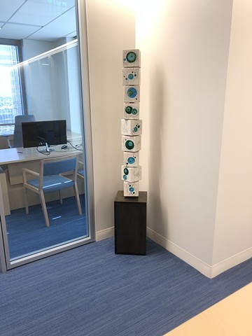 Blue green totem in an office