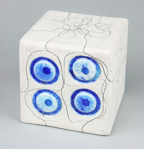 Ceramic with fused glass cube