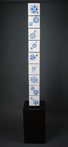 Interactive Totem Made of clay, glass, iron wash, wood, steel