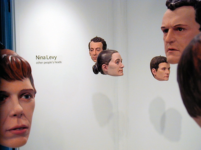 several portrait heads installed at Metaphor Contemporary Art Gallery