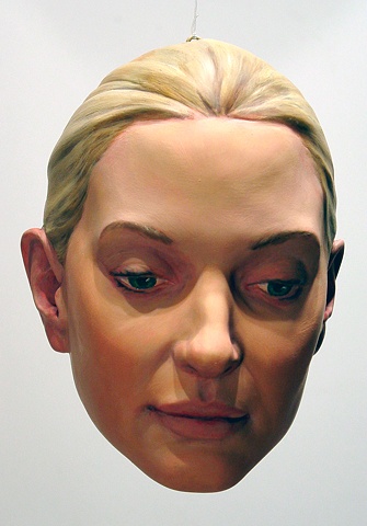 sculpted painted portrait head of curator Sabine Walli