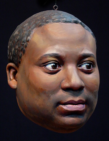 sculpted, painted portrait head of artist Rico Gatson