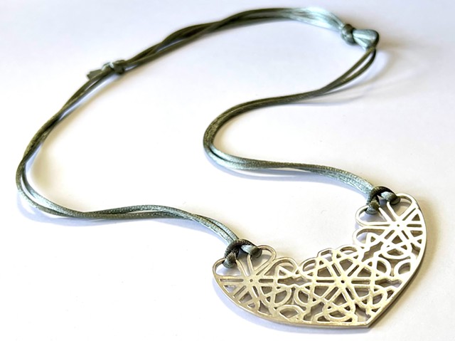 Geometric Lace Heart necklace (2013–2025)