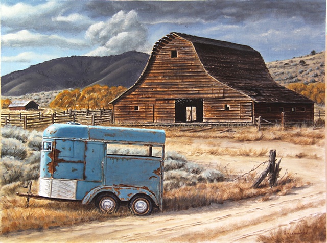 A rustic barn and rusting horse trailer speak of better days that have come and gone on this Montana ranch west of Flathead Lake.