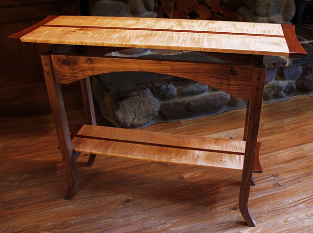 Classic console table with curly maple and Lacewood top and lower shelf, a Black Walnut.