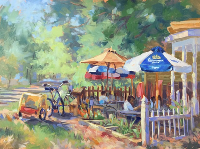 Umbrellas at cafe on Loveland bike trail