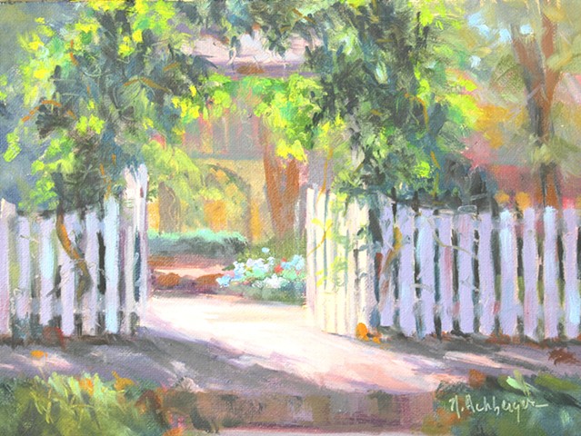 White fence and arbor