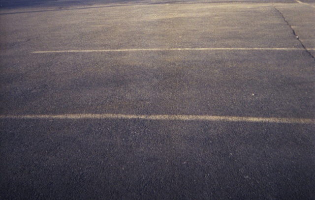 color photograph of parking lot by iris grimm