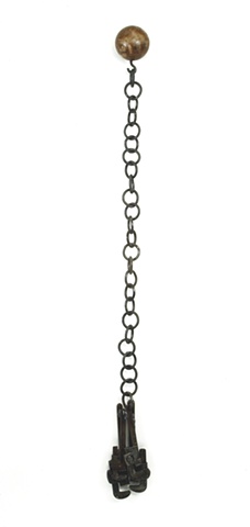 handwrought steel chain, wrenches, bowling ball, wall sculpture