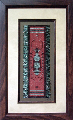 A long horned beetle from Thailand woven in sewing thread