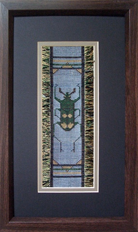 A  beetle from Thailand woven in sewing thread