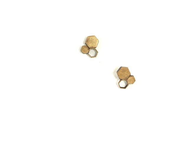 Triad earring: brass hexagons of various sizes, simply atomic by Jennifer Bennett