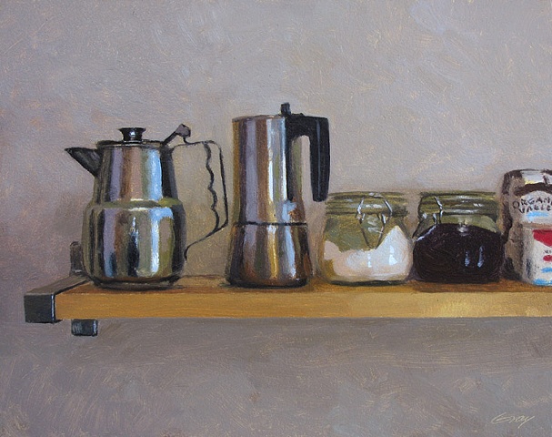 Kitchen shelf with metal coffee pots, objects.