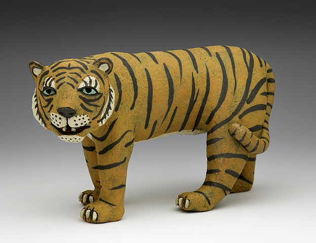 Ceramic tiger stripes teeth by Sara Swink
