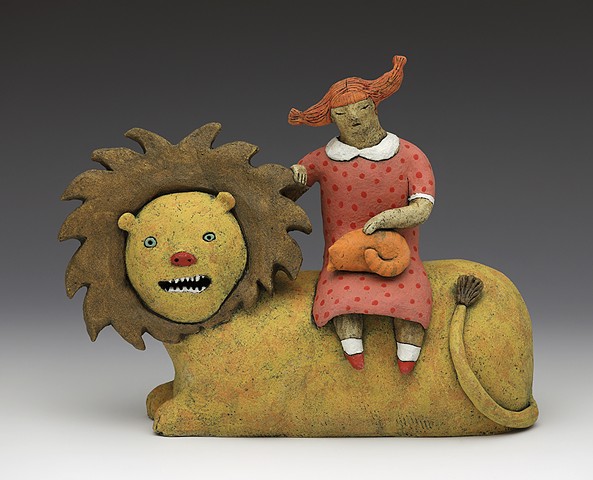 ceramic figure clay lion cat lap cat, girl polka dot dress pigtails teeth by Sara Swink