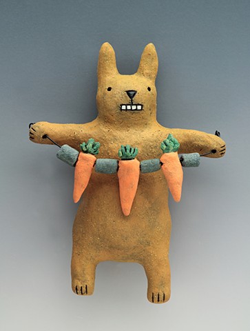ceramic figure rabbit carrot bunny wall art pottery by Sara Swink
