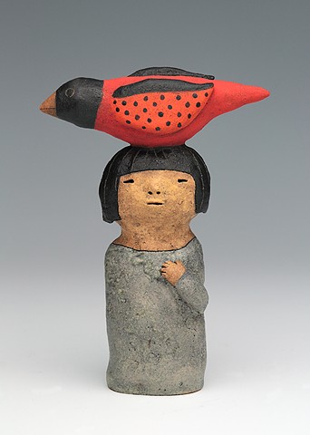 ceramic figure with bird by Sara Swink