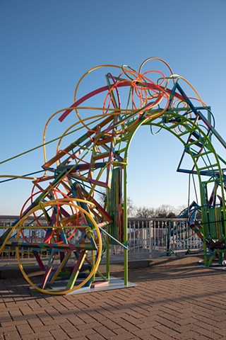 Heather Brammeier Easterseals Rainbow art installation our common threads plastic tubing garden hose reclaimed materials