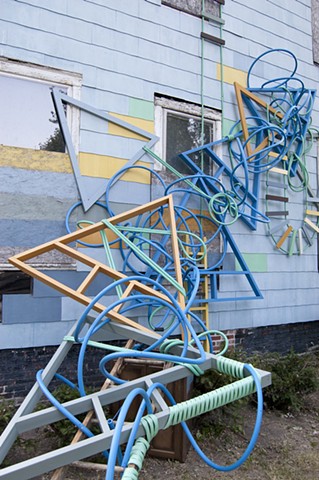 artwork installation sculpture colorful artwork progression PEX tubing reclaimed materials ladders
