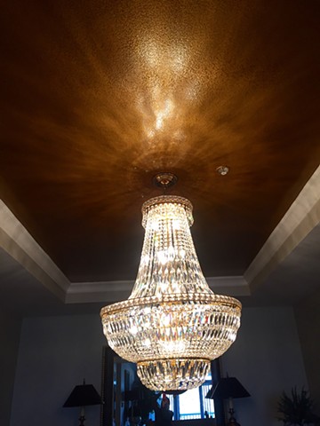 Hammered metallic gold ceiling