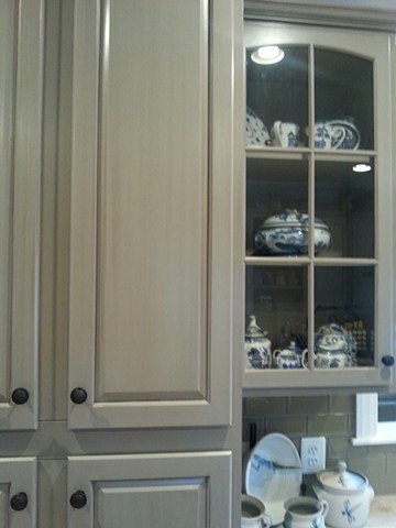 Ashley gray painted cabinets with gray glaze 
