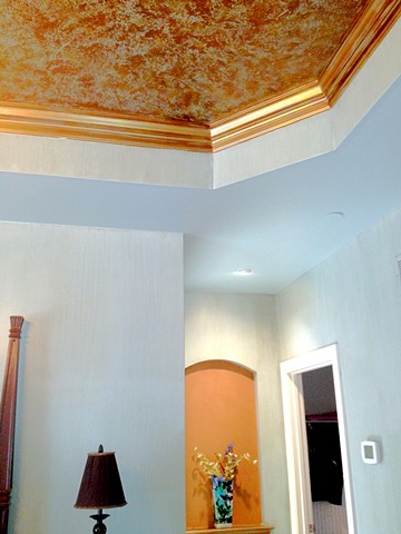 Artistic finishes and textured walls in a master bedroom paint
