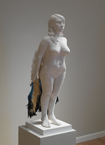 installation with ceramic and mixed media figure with bird wings by leigh craven