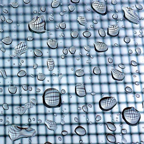 SLO Rain Drops and Quantum Mechanics - Light Liquid and Solids