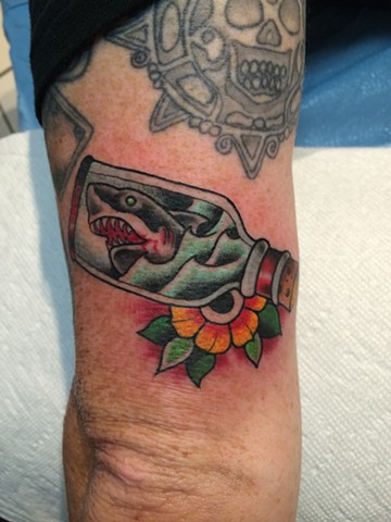 tiny shark in bottle tattoo