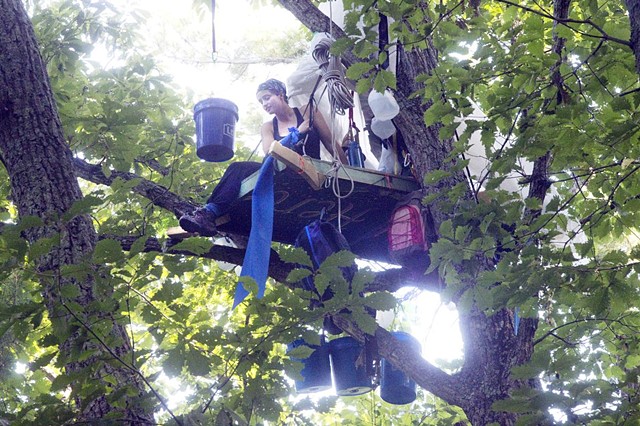 A Water Flag hangs from the tree stand alongside the right of way of the Mountain Valley Pipeline, recently erected and occupied by frontline activist Lauren Bowman.Photo credit: Heather Rousseau for the Roanoke Times