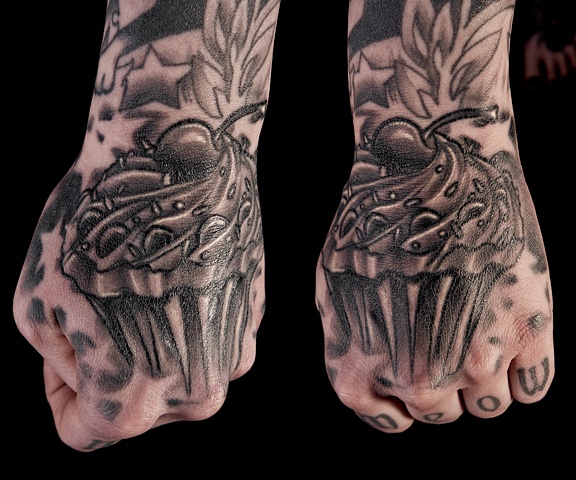 cupcake black and grey hand tattoo