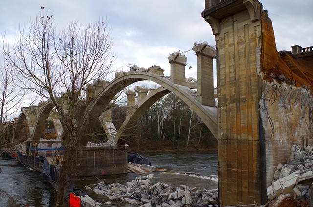 All arches exposed and ends coming down.  Upstream west bank.